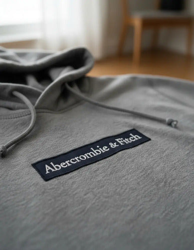Canguro Abercrombie & Fitch Original Logo Escrito Nuevo M Gris